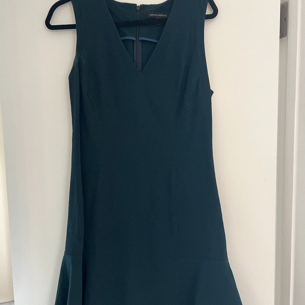 Banana Republic. Worn Once. Beautifully constructed dark green v-neck dress.
